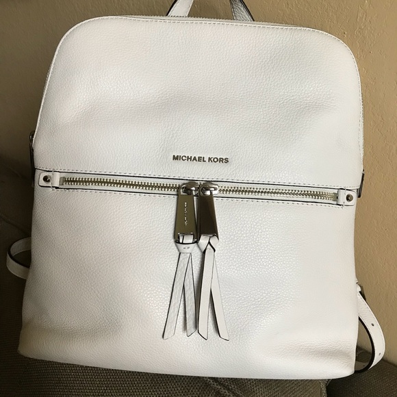 Michael Kors Handbags - Authentic Michael Kors Rhea slim leather backpack